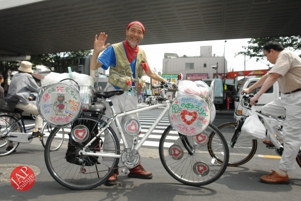 Cheerful cycling man with gay smile, his name is Captain flower (5)